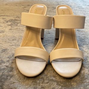 Lulus white heel sandals.  Heels are about 3 inches tall - perfect for weddings!